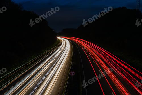 Preview: Beautiful and colorful long exposure of the driving cars on the highway at night