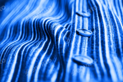 Preview: Close Up of Buttoned Striped Blue Fabric