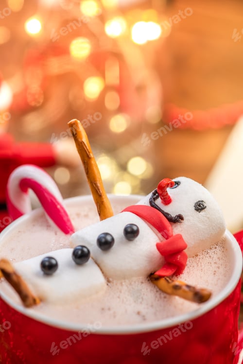 Preview: Funny Smiling Snowman Relaxing in Hot Chocolate Cup