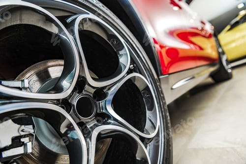 Preview: Vehicles For Sale Inside Car Dealer Showroom Wheel Close Up