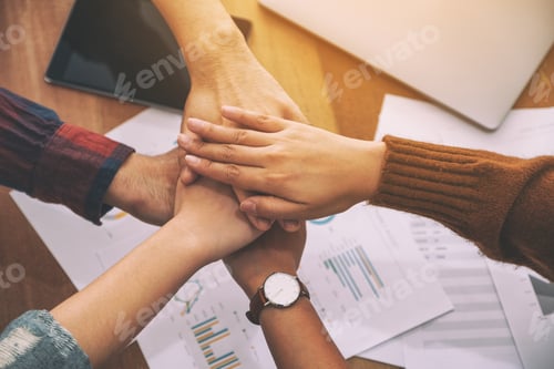 Preview: Top view image of businessman putting their hands together in the meeting