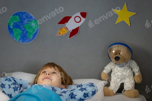 Preview: Happy child sleeping at home