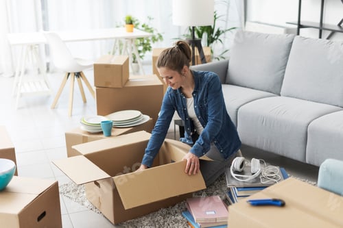 Preview: Woman unpacking in her new apartment