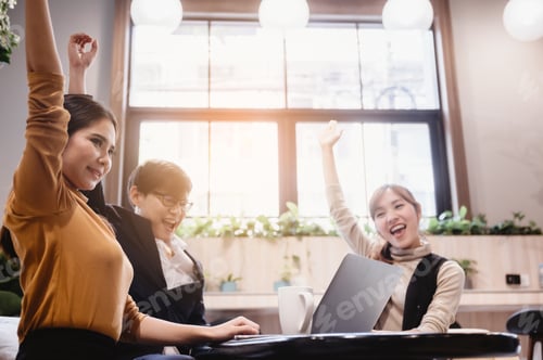 Preview: creative worker and business team discussing in modern co-working space