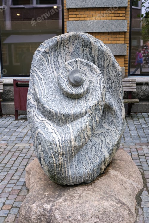 Preview: Ammonite fossil shaped sculpture.
