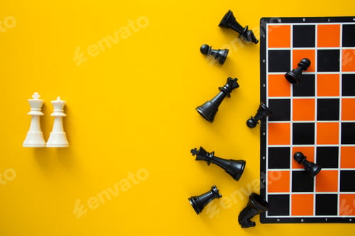 Preview: Top view chessboard on yellow background - Winner and Loser