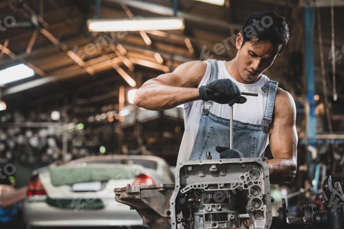 Preview: Concentrated technician experienced car engine repair specialist, Confident Asian man auto mechanic