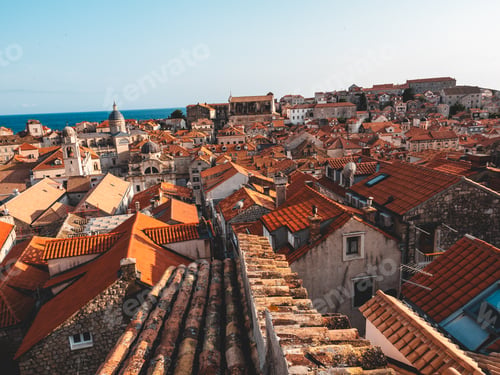 Preview: Roofs adorned with vibrant red and orange tiles