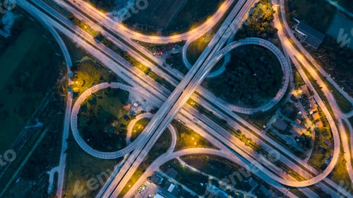 Preview: Aerial top view of highway and overpass in city at night, Aerial view the traffic and intersection.