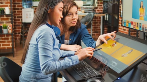 Preview: Team of photographers working on photography edit with touchscreen monitor