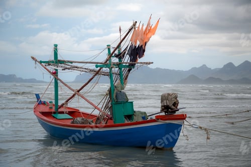 Preview: Thai long tail boat during low tide in ocean