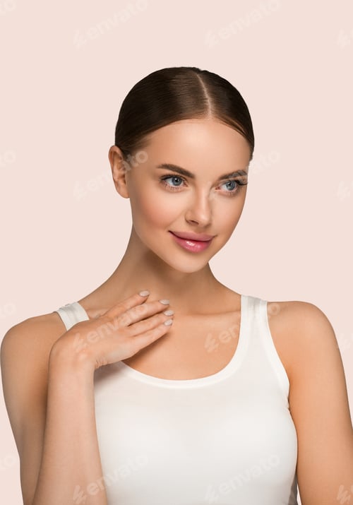 Preview: Beautiful skin woman model with hands. Natural makeup beauty face pink lips. Color background yellow