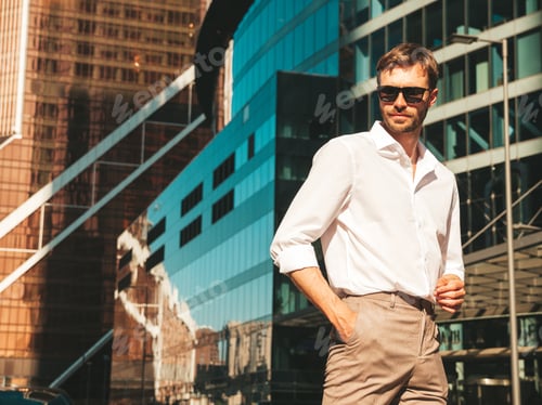 Preview: Handsome man posing outdoors