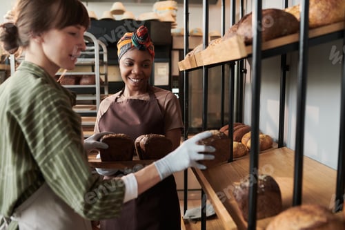 Preview: People baking bread in bakery