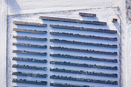 Preview: Snowy photovoltaic farm in winter. Alternative energy in Poland