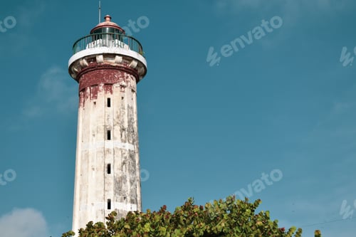 Preview: Low angle shot of an old lighthouse in Puducherry, India