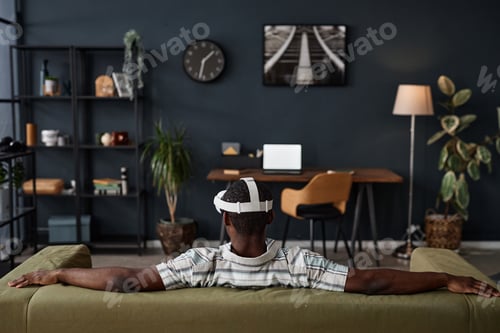 Vista previa: Unrecognizable Man In VR Headset Relaxing At Home