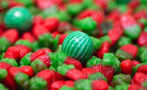 Preview: Green and red jelly beans, macro shot.