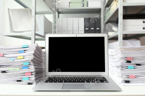 Preview: Laptop and documents on desk in office. Space for text