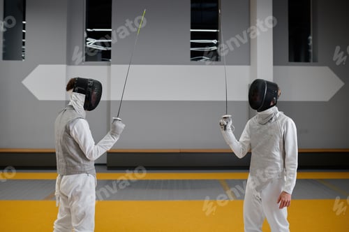 Preview: Two fencers staying with raised rapiers front of each other ready to fight