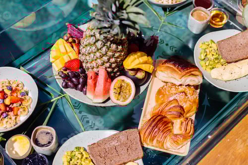 Preview: Floating breakfast at amazing hotel villa in blue swimming pool