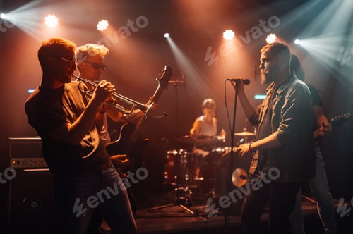 Preview: Music band playing live on stage during a concert
