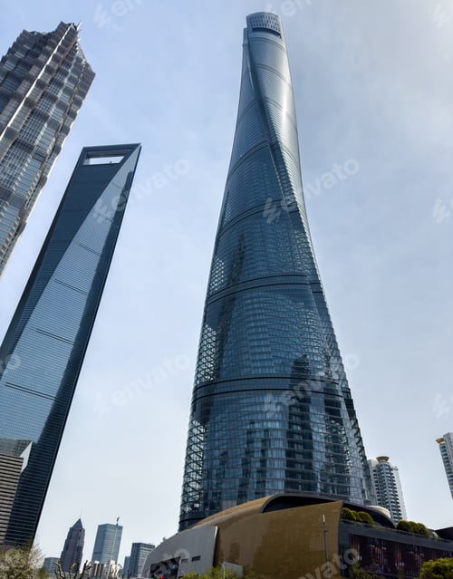 Preview: Shanghai city high rise buildings against blue sky, China. Business skyscrapers low angle view.