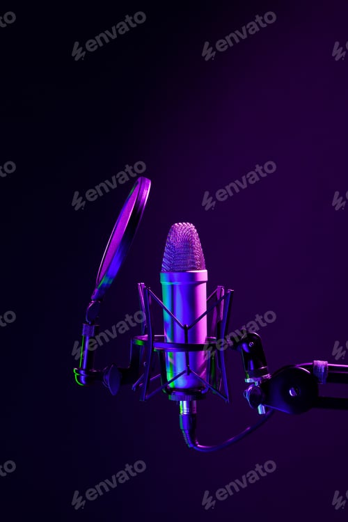 Preview: Professional microphone against black background in studio