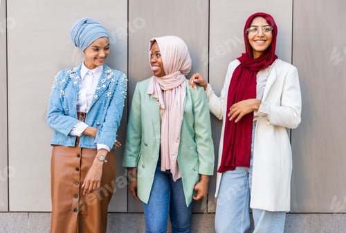 Preview: Smiling Women in Colorful Jackets and Headscarves