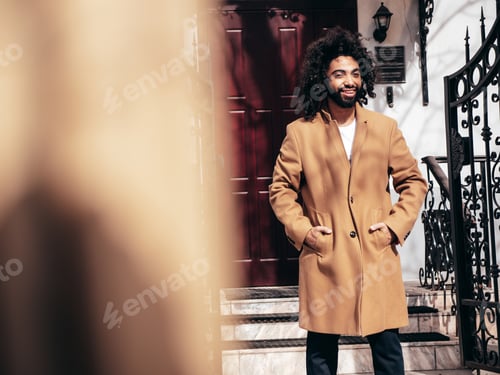 Preview: Handsome man posing outdoors
