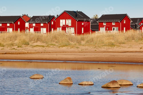 Preview: Red wooden houses near Marjaniemi beach, Hailuoto island. Finland. Travel