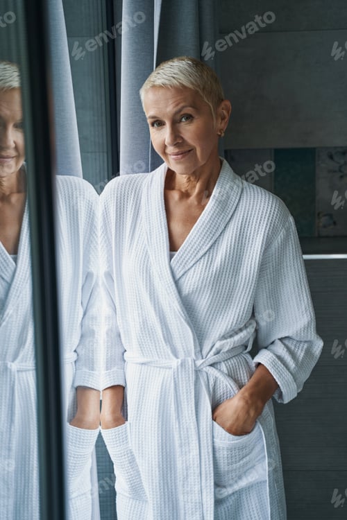 Preview: Positive delighted female person enjoying her spa day