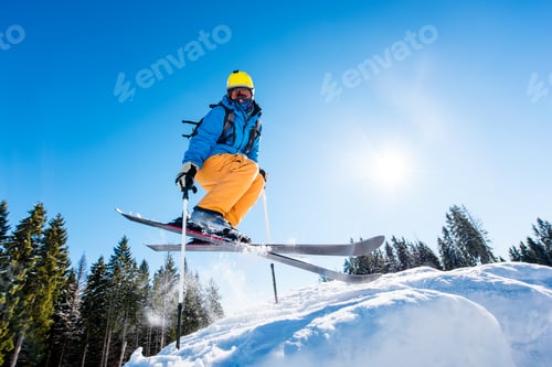 Preview: Skier skiing in the mountains