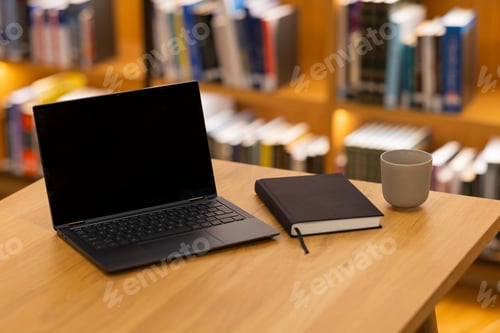 Preview: Laptop with notebook and coffee cup