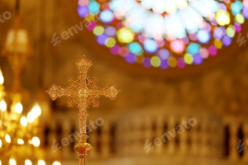 Preview: The cross standing on christian church and flare background.
