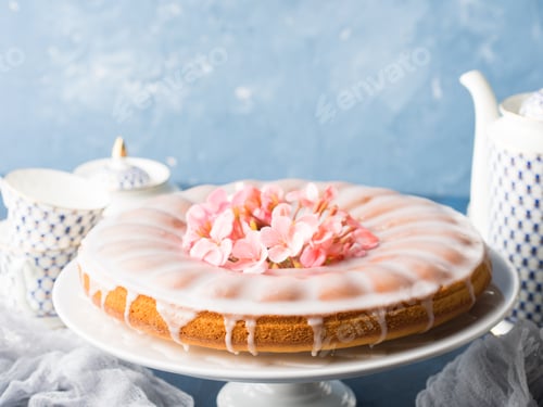 Preview: Bundt cake with frosting. Festive treat spring flowers