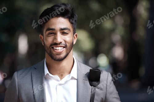 Preview: A dedicated professional. Shot of a young businessman standing in the city.