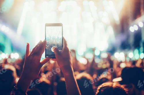 Preview: Portrait of happy crowd enjoying at music festival
