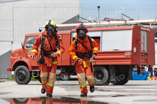 Preview: A team of confident and accomplished firefighters strides purposefully in their uniforms, exuding