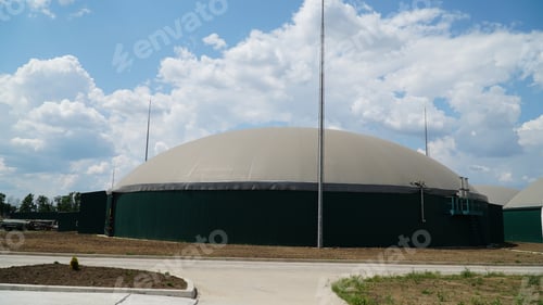 Preview: Biogas. Modern bio comlex. Renewable energy from biomass. Innovative biogas plant among green nature