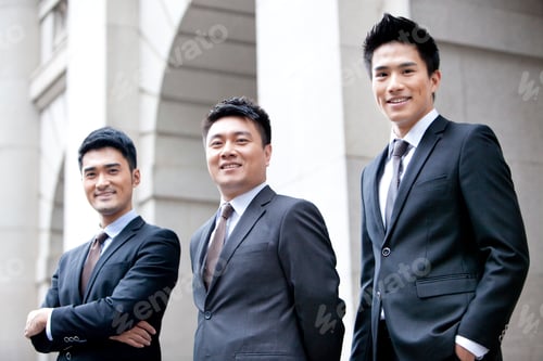 Preview: Portrait of confident business team in front of a building, Hong Kong