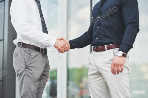 Preview: Handshake of two men. Successful business contacts after a good deal
