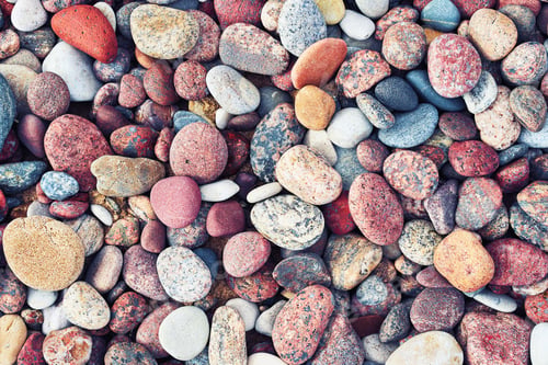 Preview: Multicolored colorful sea pebbles, nature background. Small stones. Top view