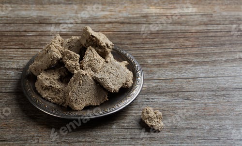 Preview: Vegetable-based halva sweet prepared from seeds on wooden background