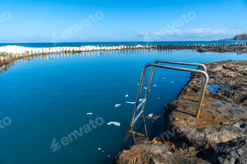 Preview: Stairs in the Las Salinas de Agaete natural pools in Puerto de Las Nieves in Gran Canaria, Spain.
