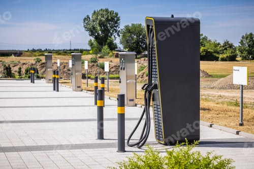 Preview: Power supply for electric car charging, charger at parking lot.