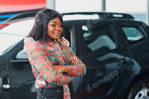 Preview: Women buying the car. Ladies in a car salon. Black girls near white car