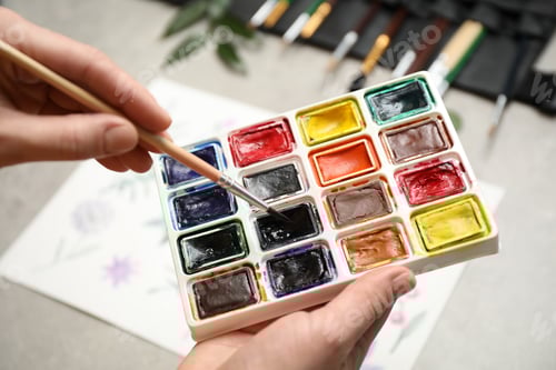 Preview: Watercolor Palette with Paintbrush Ready for Artistic Creation