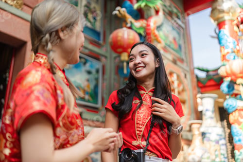 Preview: Celebrating chinese new year worship at a shrine cultural gathering urban environment close-up view