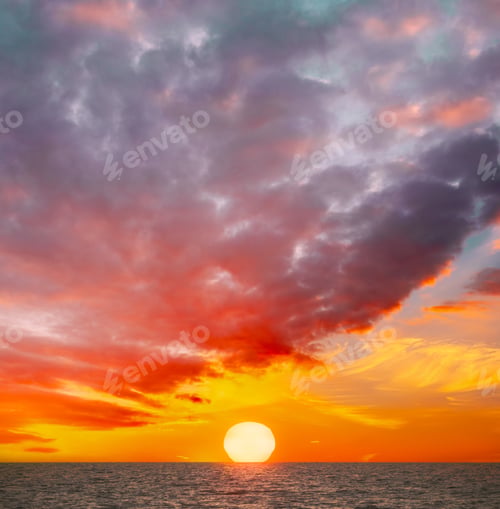 Preview: Natural Color Sunset Sunrise Sky Over Sea. Seascape With Shining Setting Sun On Sea Horizon